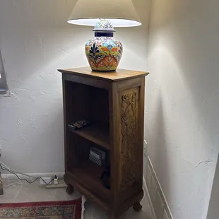 Talavera lamp and hand carved shelf.