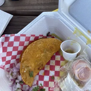 There a cockroaches inside the taco the lady in the front was still trying to argue she check it before she deliver the food