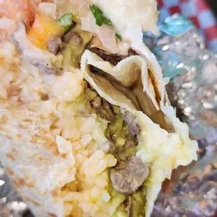 First bite of asada everything burrito