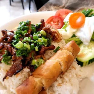 Com tam thit nuong (broken rice with grilled pork) and an egg roll and tau hu ky (fried shrimp paste)