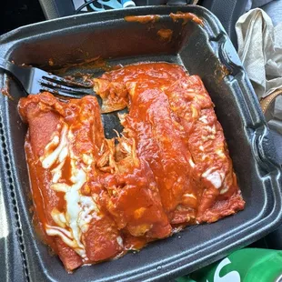 Corn chicken enchiladas with red sauce