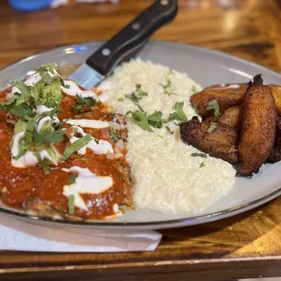 Guajillo Chicken with Cheesy rice and fried Plantains