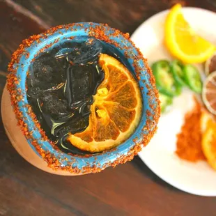 House-made Paloma with dried garnishes  -Top Shelf Altos reposado, Jarrito grapefruit, lime,and  tajin rim