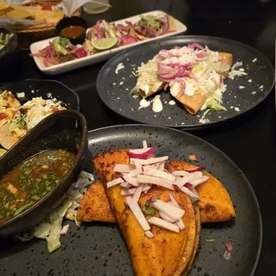 Seafood tacos, burria tacos, wings, trio tacos, guacamole. All yum!
