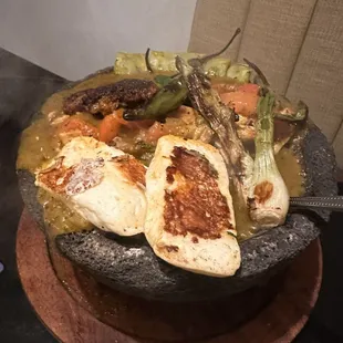 Molcajete Combo (chicken and steak). Comes with tortillas only. No rice or beans.