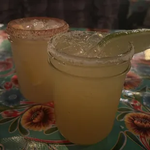 Mezcal margarita w/ chili rim &amp; in front the Cadillac