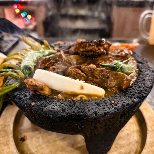 Molcajete combo with chicken, steak.