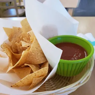 Complimentary chips and hot sauce.