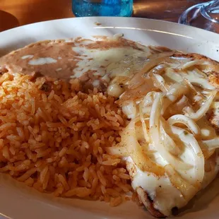 Pollo Que Pasa - marinated grilled chicken topped with sauteed onion and melted cheese