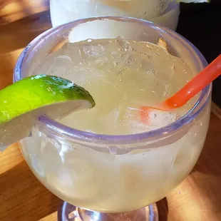 two margaritas on a table