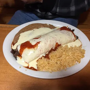 Steak burrito. Again smothered in that queso. It wasn't mine but he ate the whole thing.