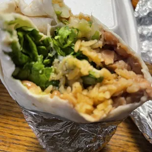 Veggie burrito.  no sour cream, no cheese.