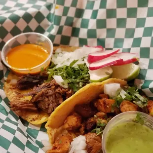 a plate of food with a side of guacamole