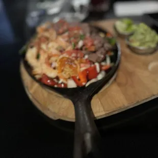 Shrimp and beef fajitas.