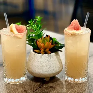 two cocktails on a table