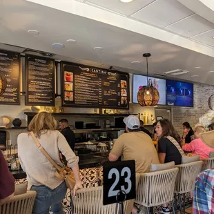 Bar with Menu board and tvs