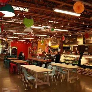 Grab food from any food cart and eat inside in the air conditioned building.