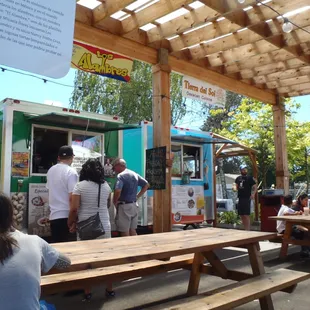 people ordering food from a food truck