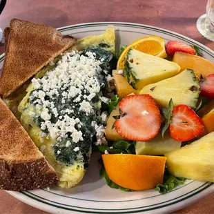 Spinach omelette and &apos;side of fruit&apos;!