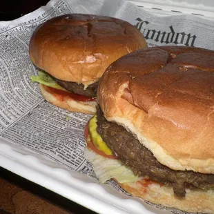 two hamburgers on a tray