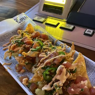 I didn't expect food to be this great here for a gay bar. Poke nachos are to die for.