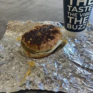 a sandwich and a cup of coffee