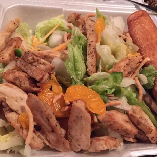 a salad with meat and vegetables