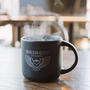 a cup of coffee on a table