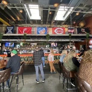 people sitting at a bar