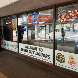 a man standing in front of a store