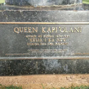 On the base of the statue