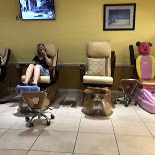 Pedicure chairs and tv