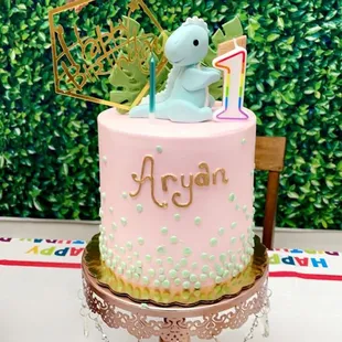 my son's First bday (simple baby dinosaur themed)  White sponge, vanilla Bavarian cream and chocolate mousse. - exterior buttercream