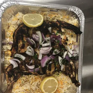 a fish with onions and lemon