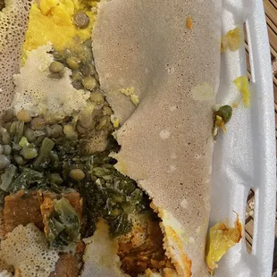 Vegetarian Combination Not very pretty but tasty! Just wish they hadn't packed it on injera as I requested :(