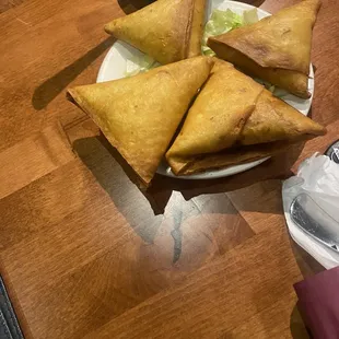 a plate of samata and a cup of coffee