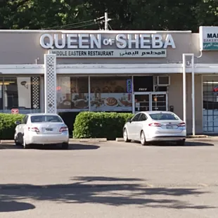 cars parked in front of the store