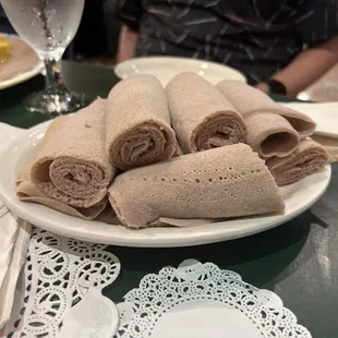 Endless injera- they keep bringing you more. Tangy and spongy.