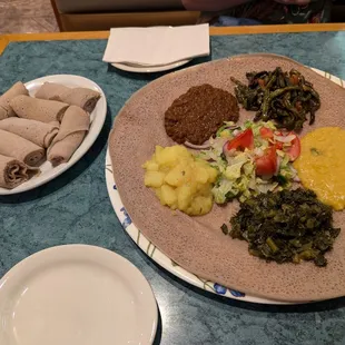 Injera, vegetarian (which is secretly vegan) favor for two.