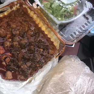 Berbere Beef, mushroom, salad, and Injera.