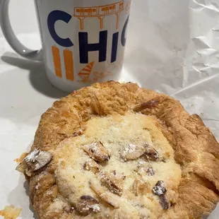 a pastry and a cup of coffee