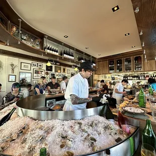 a chef preparing food in a restaurant