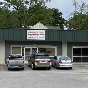 cars parked in front of the store