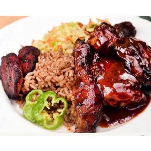 a plate of meat and rice