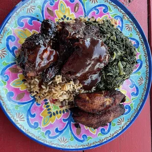 Bbq jerk chicken, rice and peas, Caribbean style spinach