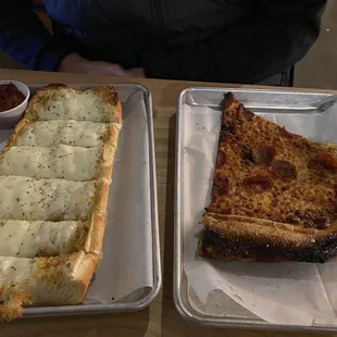 Pepperoni pizza, garlic bread