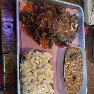 Brisket plate with brisket baked beans and smoked Gouda Mac and Cheese. Outstanding!