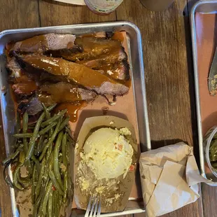 Beef Dinner.  Wrapped on the corner is Texas toast.