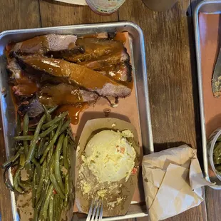 Beef Dinner.  Wrapped on the corner is Texas toast.