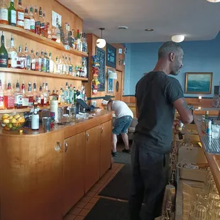 a man standing at the bar